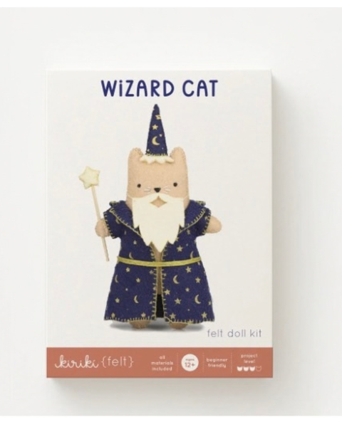 A felt doll kit box for a 'Wizard Cat' by Kiriki (felt), featuring an illustration of a cat dressed in a dark blue wizard robe with gold stars and a matching pointed hat, holding a wand.