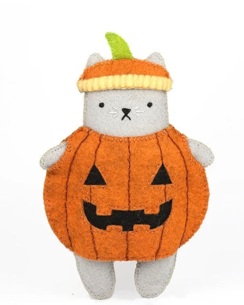 A plush felt cat toy dressed as a jack-o'-lantern pumpkin, featuring a gray cat body, orange pumpkin costume, yellow and orange striped hat, and a green stem, set against a plain white background.