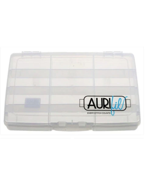 Clear plastic container with white thread, branded 'Aurifil', on a white background