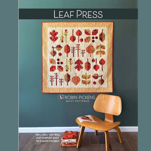 Quilt pattern cover with leaf design, wooden chair, and 'Robin Pickens Quilt Patterns' branding.