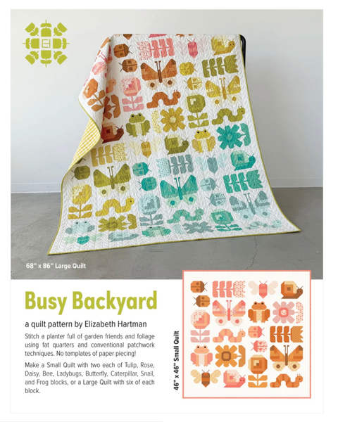 Quilt pattern with 'Busy Backyard' pattern by Elizabeth Hartman on a plain background