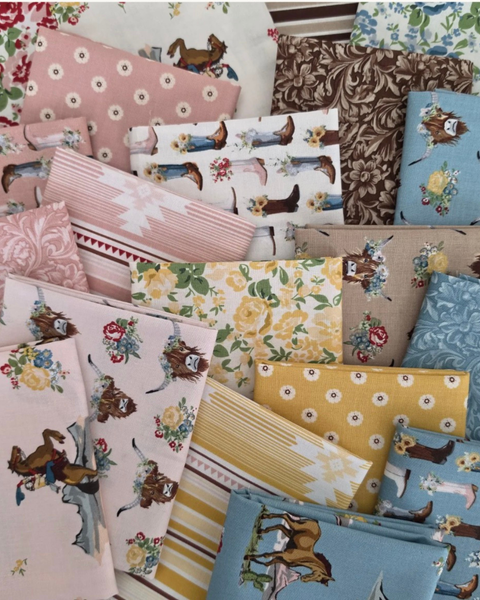Assorted fat quarter in pink, blue, yellow and brown with cowboy boots, flowers, and horses on them.