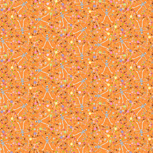 Tiny skeletons surrounded by assorted candies on an orange background