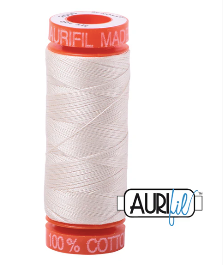 Spool of Aurifil thread with visible branding on a white background
