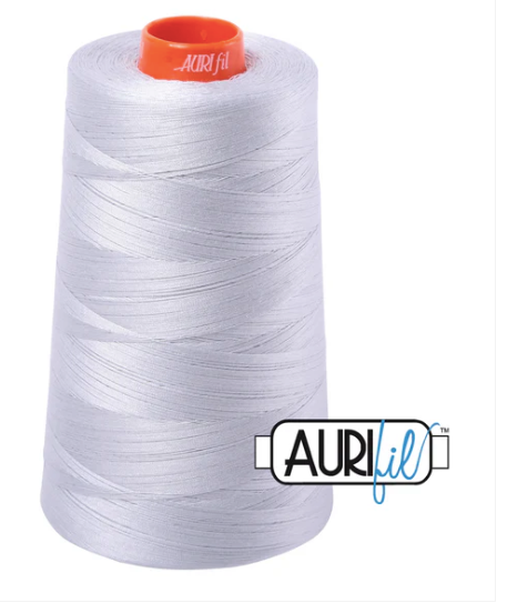 Spool of white thread with an orange top on a white background, featuring the Aurifil logo.