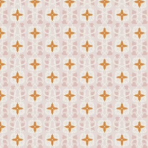 Patterned fabric with geometric design on a pink background