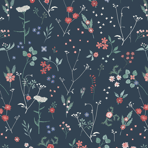 Assorted small floral stems and flowers on a dark background