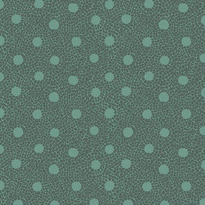 Dark green mosaic tiles around light green dots