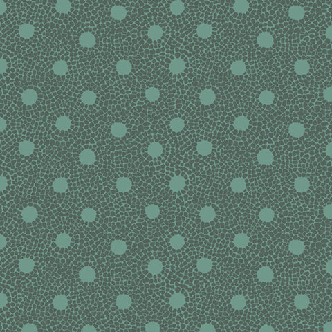 Dark green mosaic tiles around light green dots