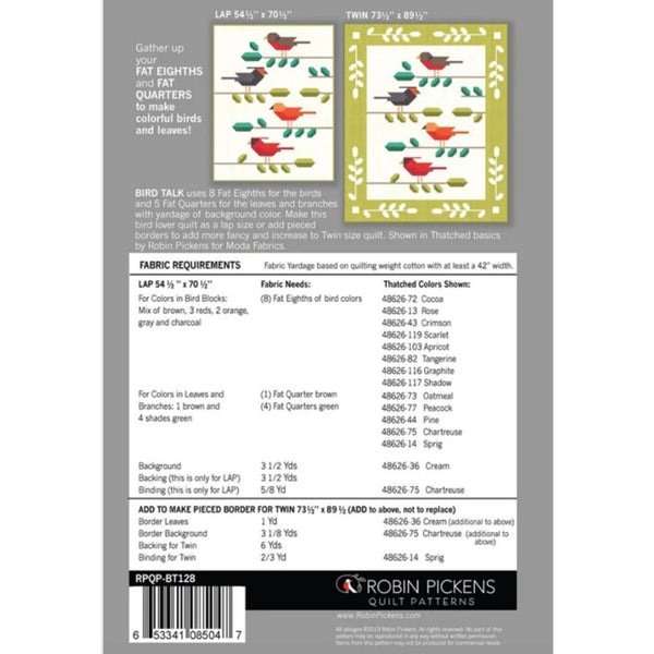 Quilt pattern leaflet with bird and leaf design on a gray background
