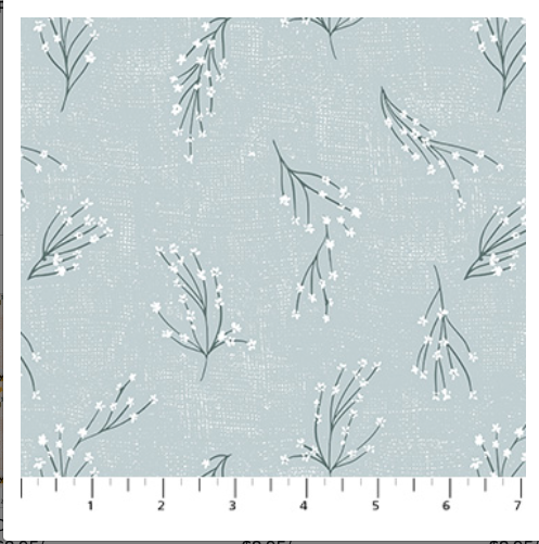 Fabric with floral pattern on a light blue background