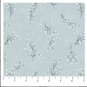 Fabric with floral pattern on a light blue background