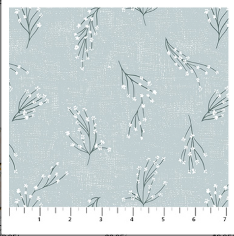 Fabric with floral pattern on a light blue background