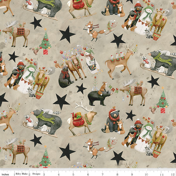 Christmas-themed fabric with reindeer, bears, snowmen, and stars on a beige background.
