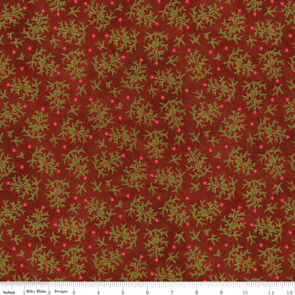 Fabric with green leaf pattern on a red background