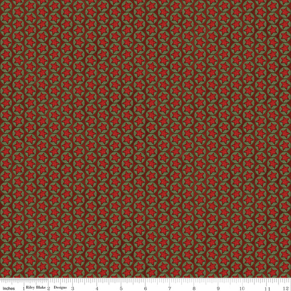 Patterned fabric with red and brown design on a plain background