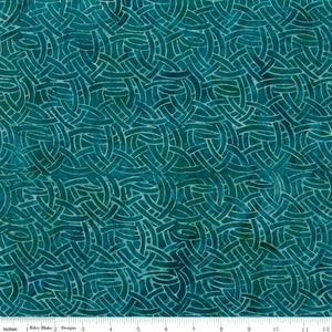Teal fabric with wavy pattern, brand 'Riley Blake' visible
