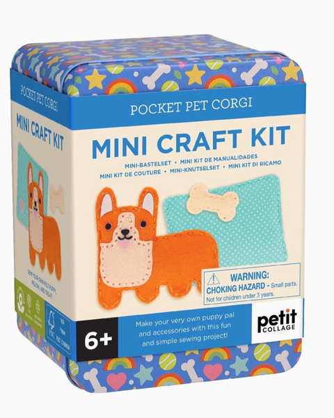 Pocket Pet Corgi Mini Craft Kit by Petit Collage in a blue and cream metal tin with colorful dog-themed patterns on the lid and sides, featuring a puppy patch and bone illustration on the front.