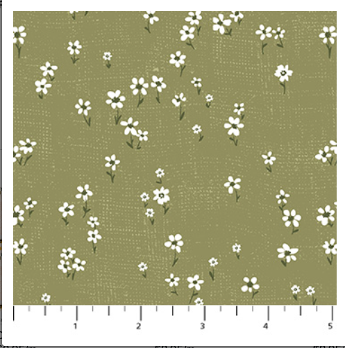 Fabric with white floral pattern on a green background
