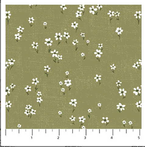 Fabric with white floral pattern on a green background