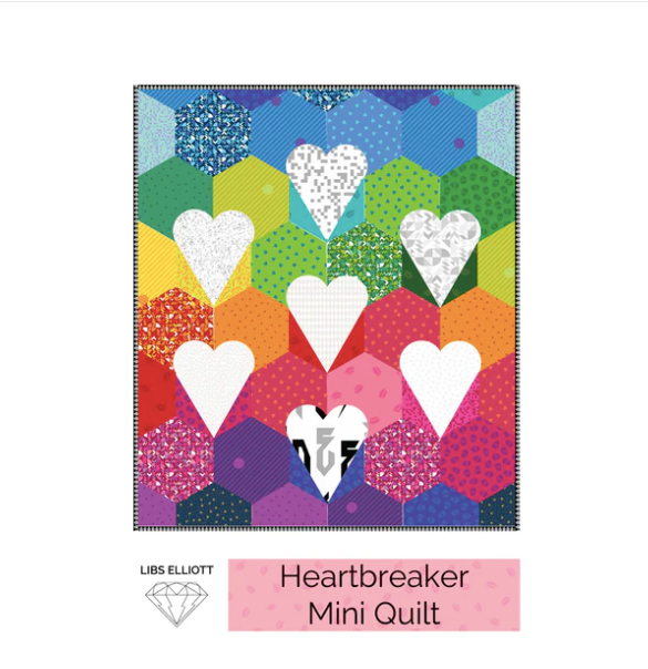 Colorful mini quilt with heart patterns and 'Heartbreaker Mini Quilt' text on a white background.