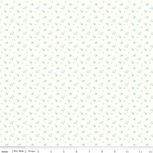 Patterned fabric with small blue flowers on a white background