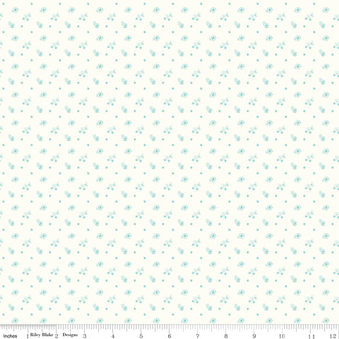 Patterned fabric with small blue flowers on a white background