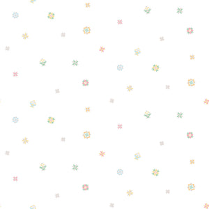 Pattern of small, colourful quilt blocks on a white background.