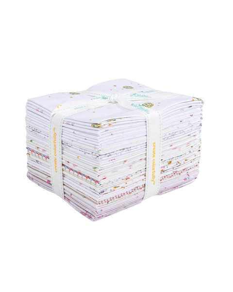 Assorted fabrics from the Hush Hush 6 collection wrapped in ribbon.