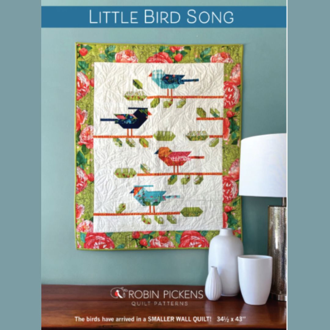 Quilt pattern cover titled 'Little Bird Song' by Robin Pickens with birds on a floral background.