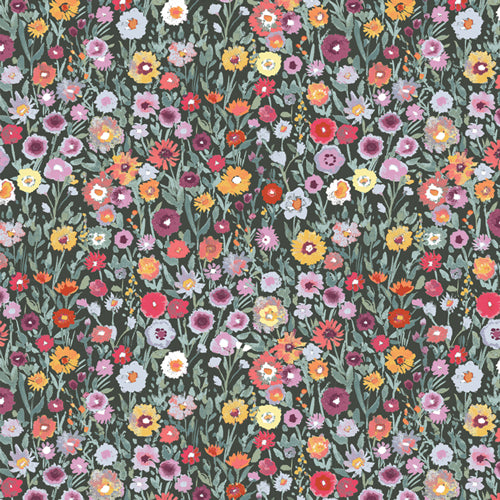 Field of multicoloured flowers on a dark green background