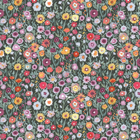 Field of multicoloured flowers on a dark green background