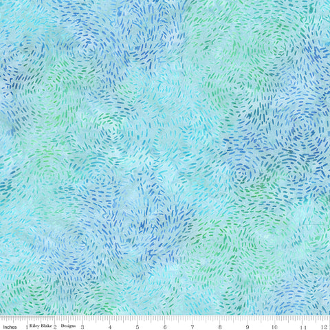 Fabric with a swirling pattern of blue and green on a light blue background