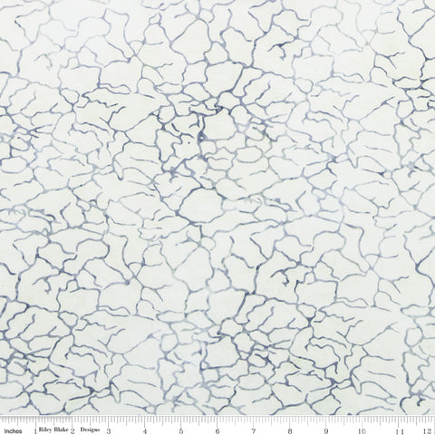 White fabric with blue cracked pattern, measurement scale at the bottom