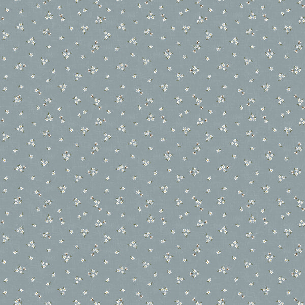 Pattern of small white flowers on a blue background