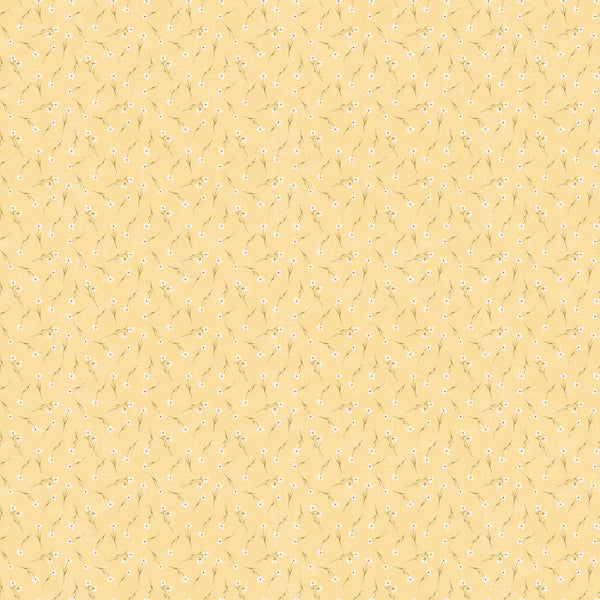 Yellow patterned fabric with small floral designs