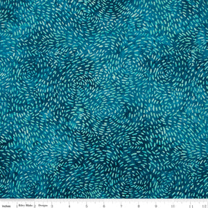 Blue fabric pattern with circular designs on a blue background
