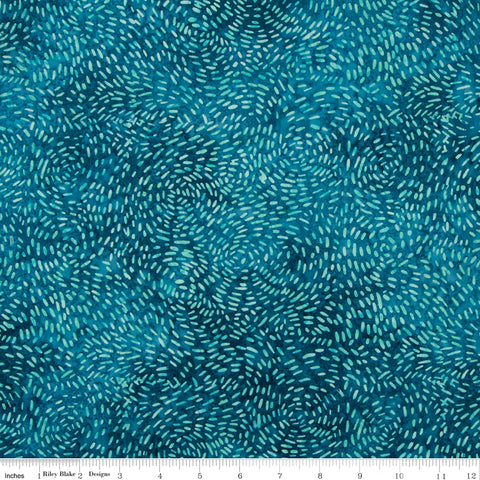 Blue fabric pattern with circular designs on a blue background