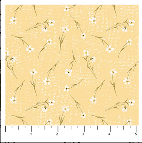Fabric swatch with white floral pattern on a yellow background