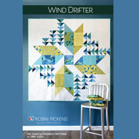 Quilt pattern cover titled 'Wind Drifter' by Robin Pickens with a geometric quilt design on a blue background.