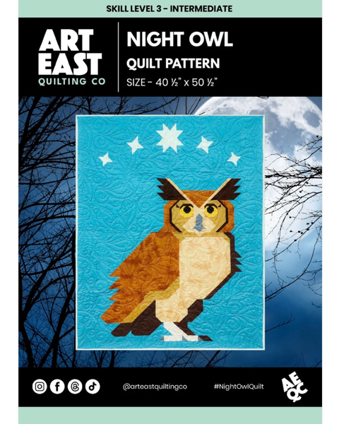 Front cover of the Art East Quilting Co. 'Night Owl' quilt pattern, showing a stylized owl patchwork design on a bright blue square with stars, centered over a dark sky and tree branches background.